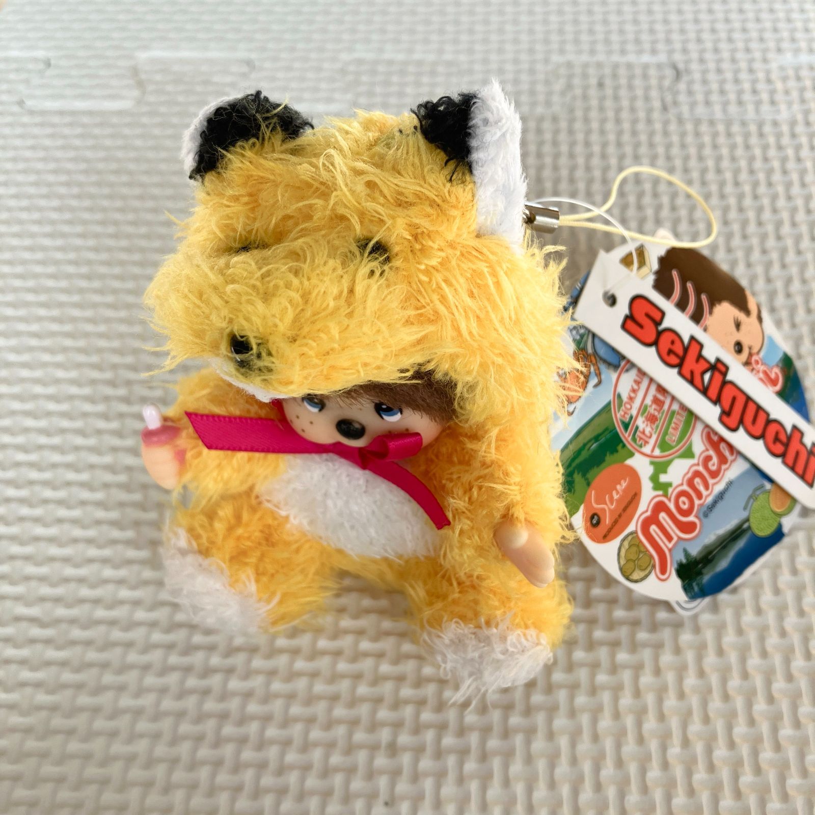 新品] 北海道限定モンチッチ もこもこぬいぐるみマスコットキタキツネ