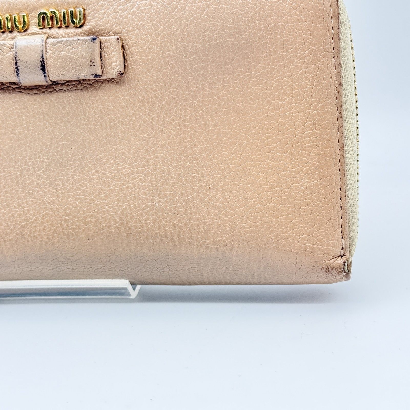 MIU MIU（ミュウミュウ）リボンモチーフ ラウンドファスナー長財布 