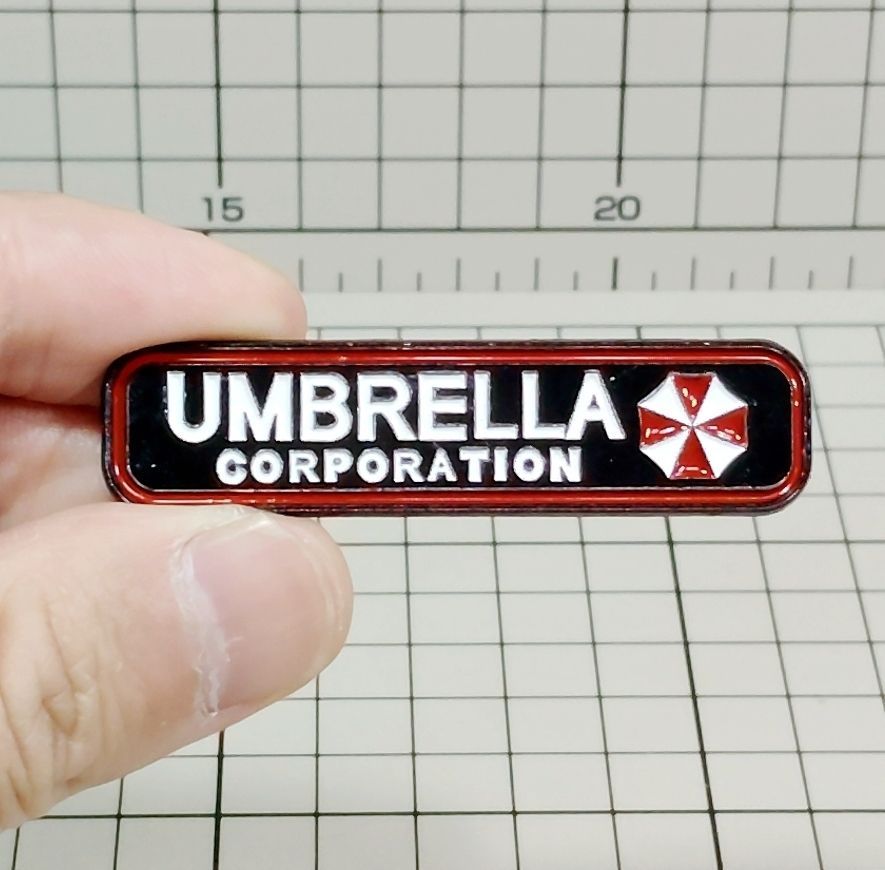 ピンバッジ アンブレラ社 （バイオハザード） #2】D02-21/SAT - メルカリ