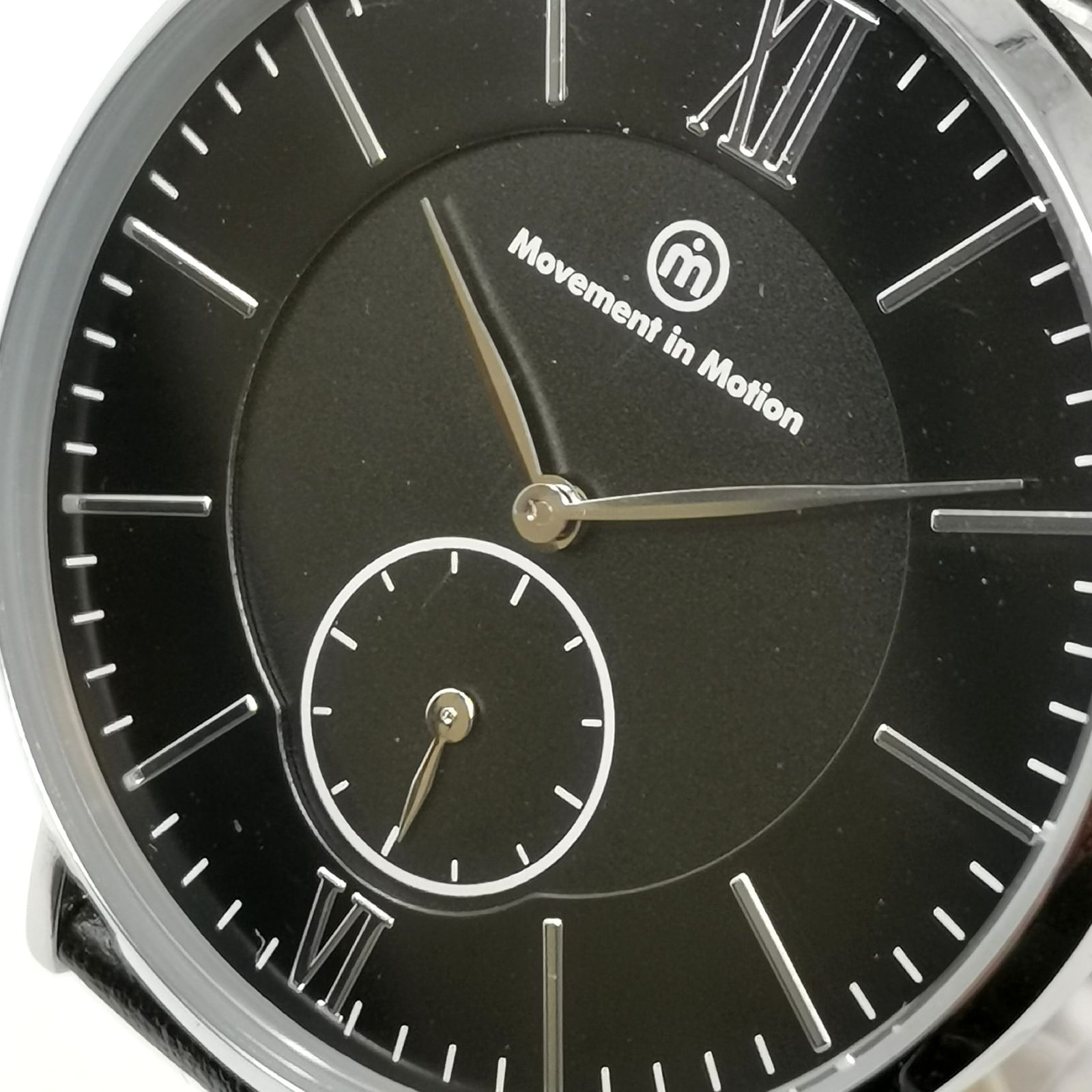 Movement in motion クォーツ メンズ腕時計 文字盤ブラック 電池切れの 