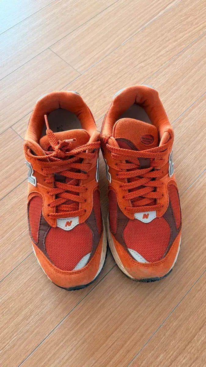 ニューバランス 2002R オレンジ ラスト オクサイド - メルカリ