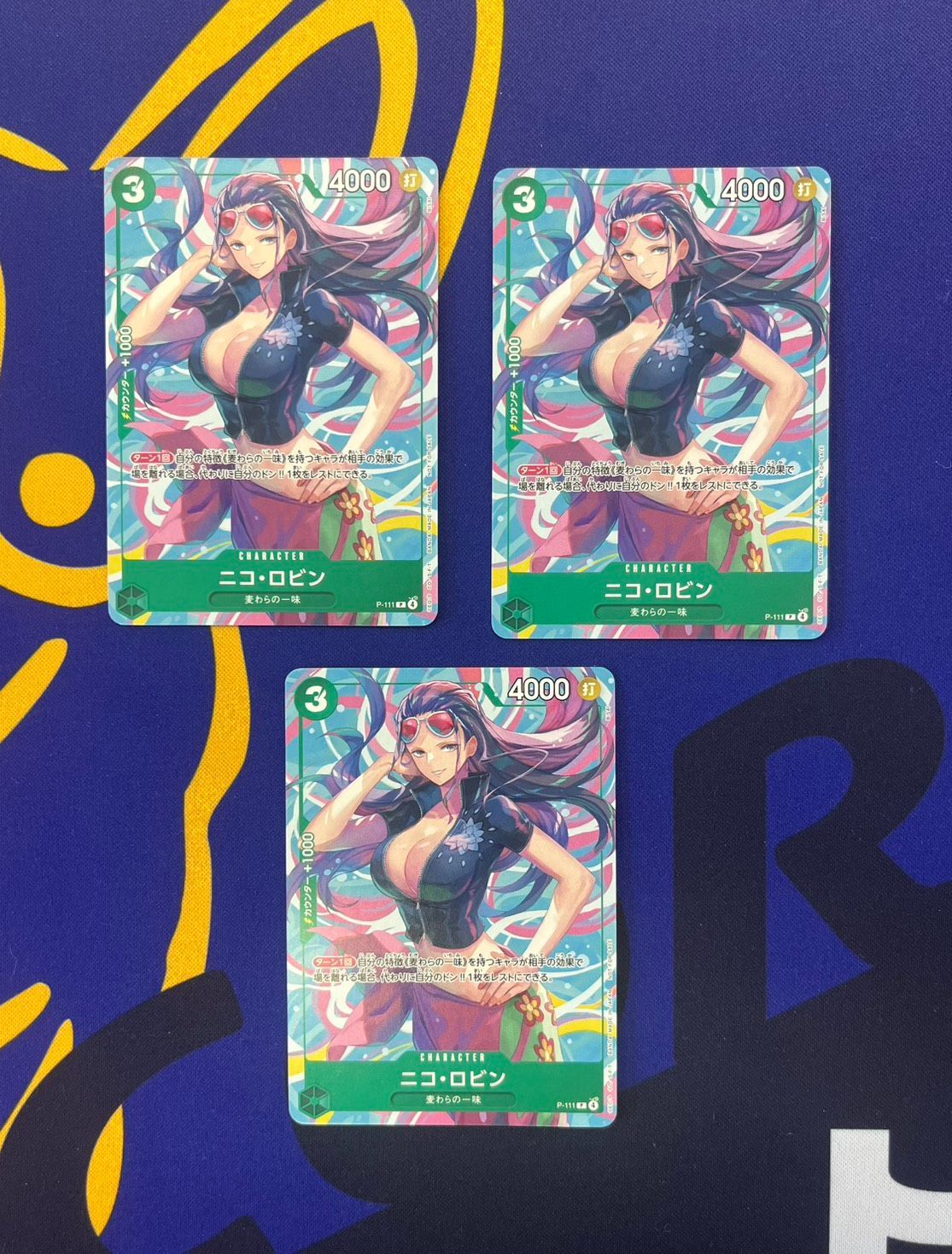 ニコ・ロビン プロモ3枚セット ③ - メルカリ