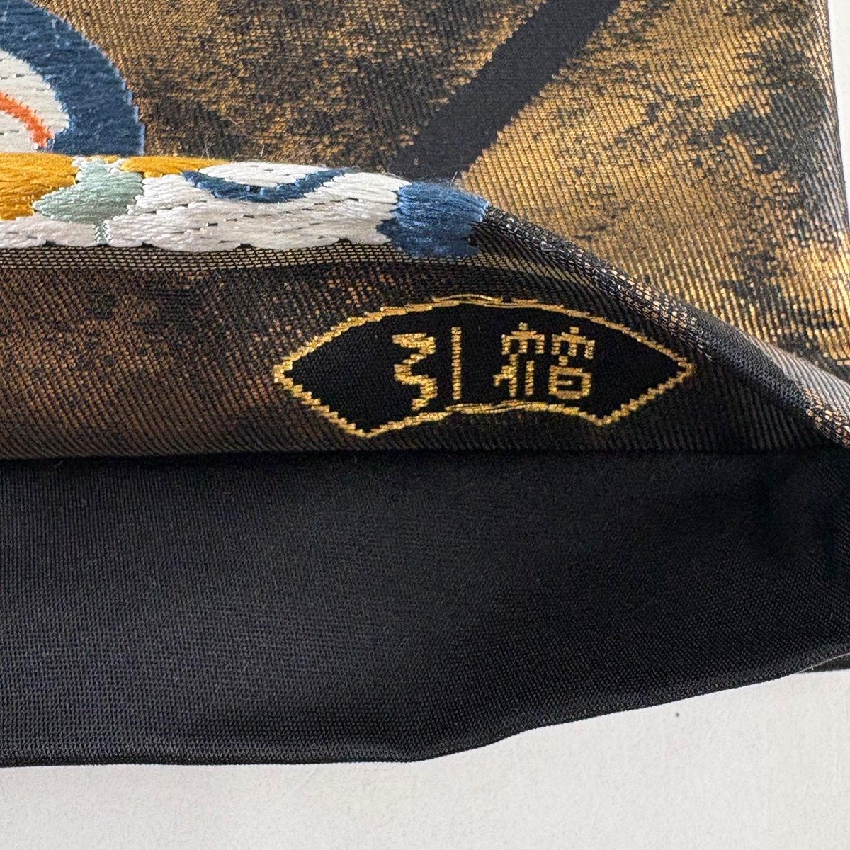 袋帯 秀品 引箔 雪輪桧垣文 花唐草 金糸 唐織 金茶 六通 正絹 【中古