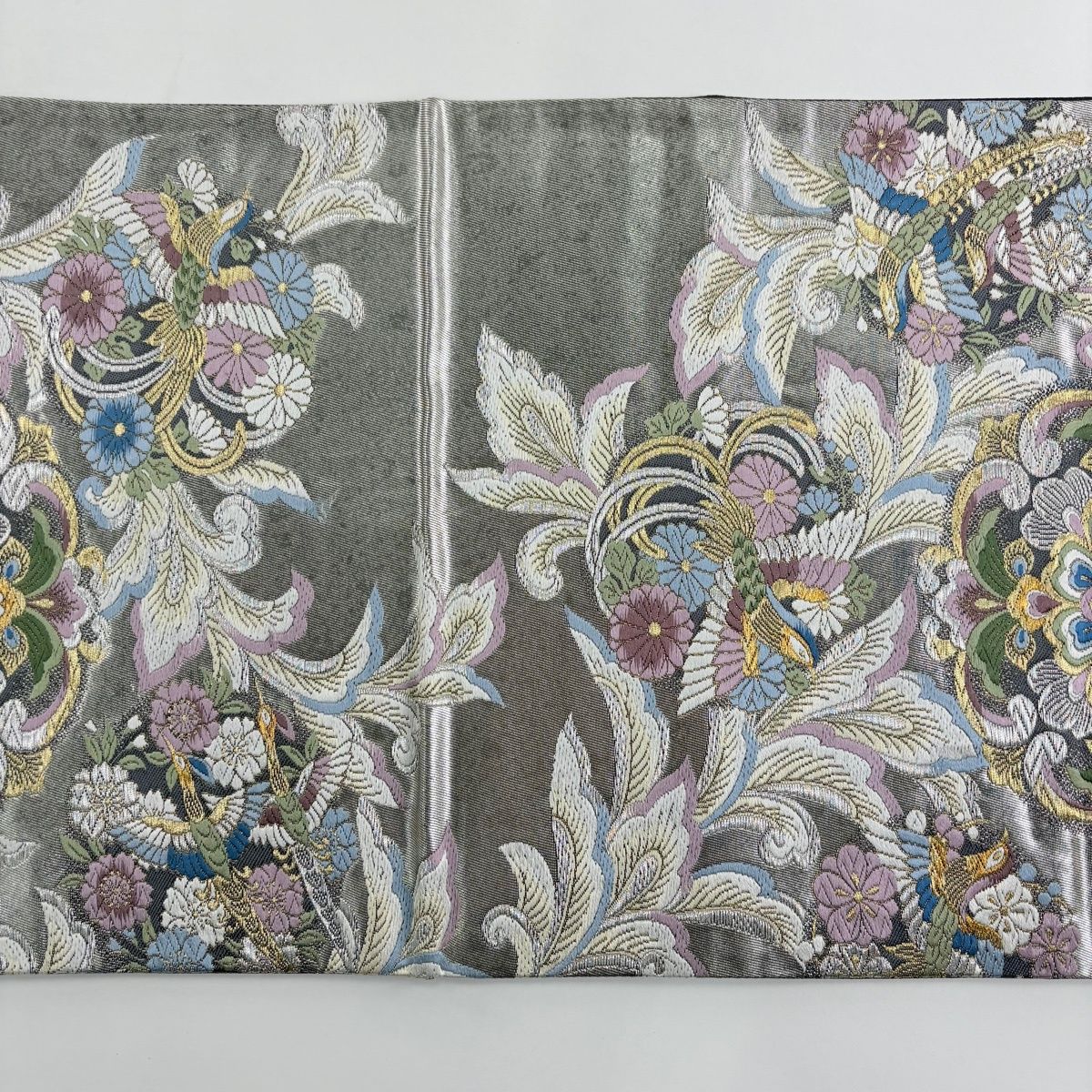 袋帯 秀品 彫装飾唐草麗華文 振袖向き 華文 花鳥 箔 金銀糸 銀色 六通