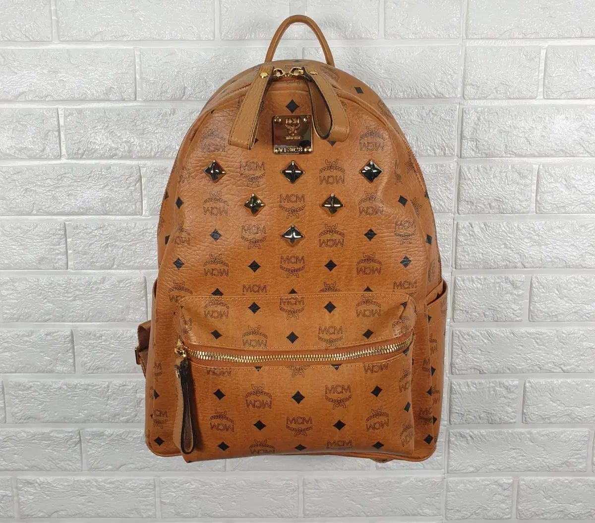 MCM オレンジバックパックリュックミディアム 【公式通販】