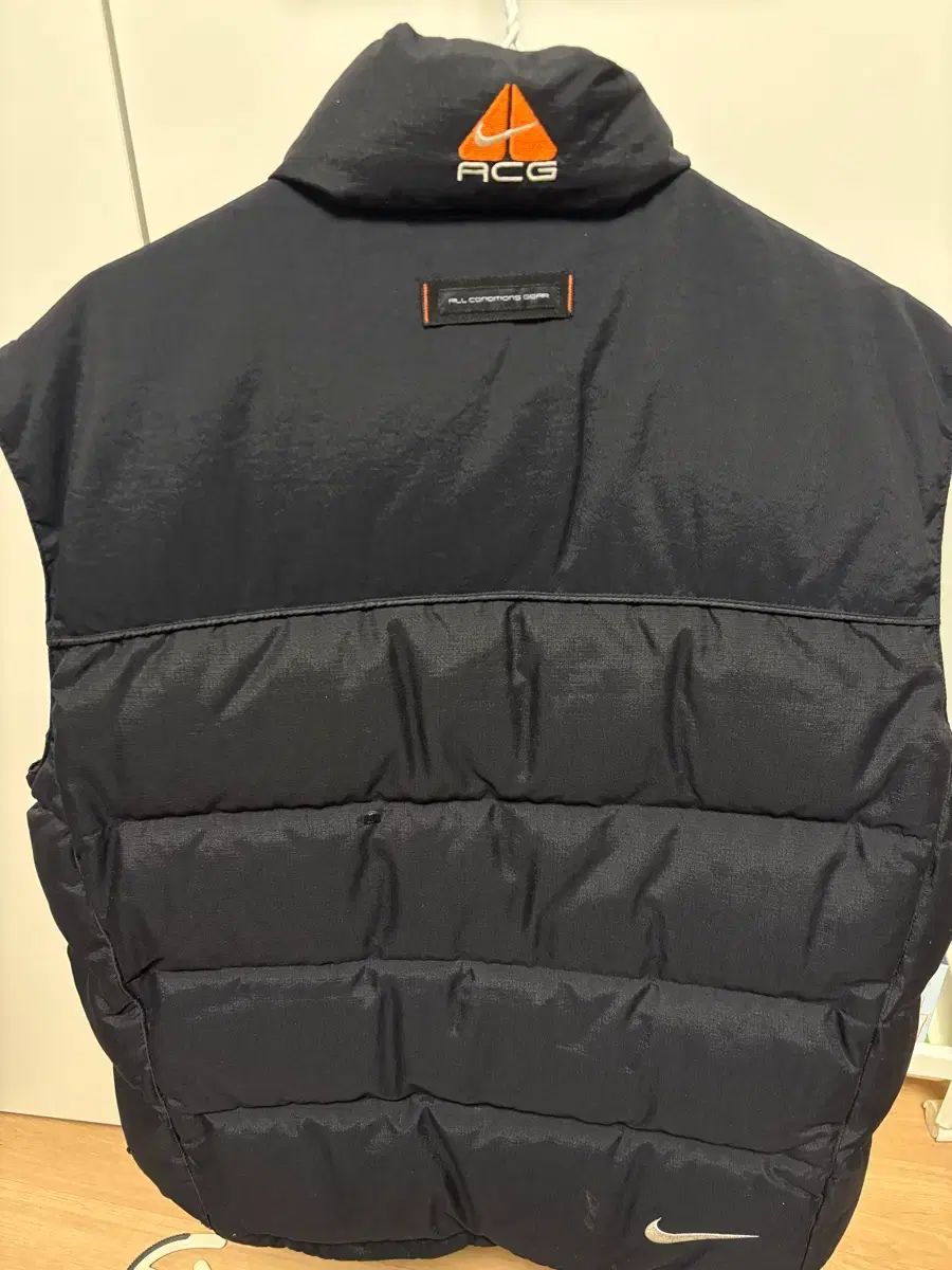 ナイキ acg ダウンベスト L - メルカリ