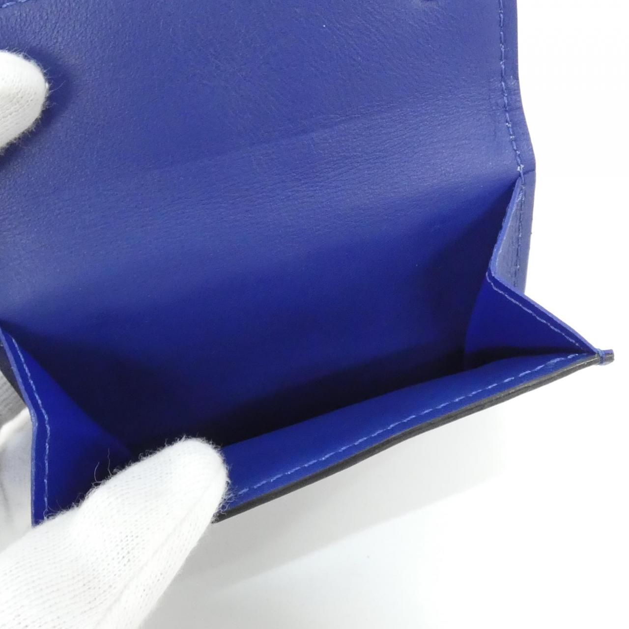 ルイヴィトン タイガ ラマ ディスカバリー コンパクト ウォレット