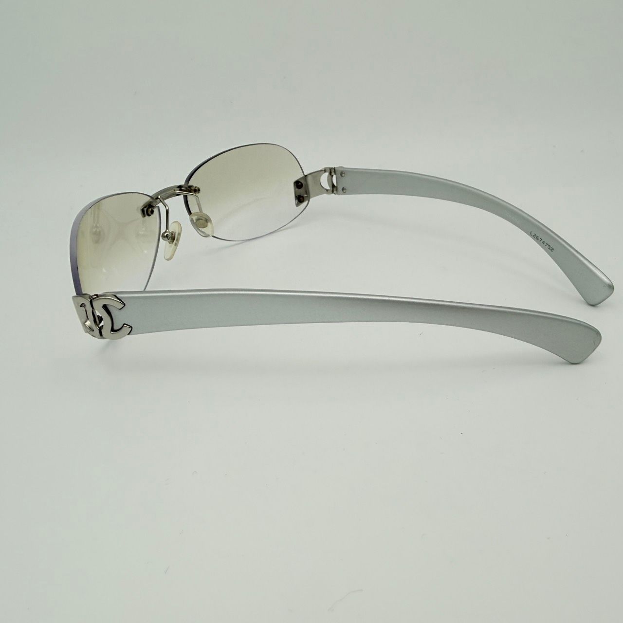 CHANEL（シャネル）ココマーク リムレスサングラス シルバー系 CCロゴ