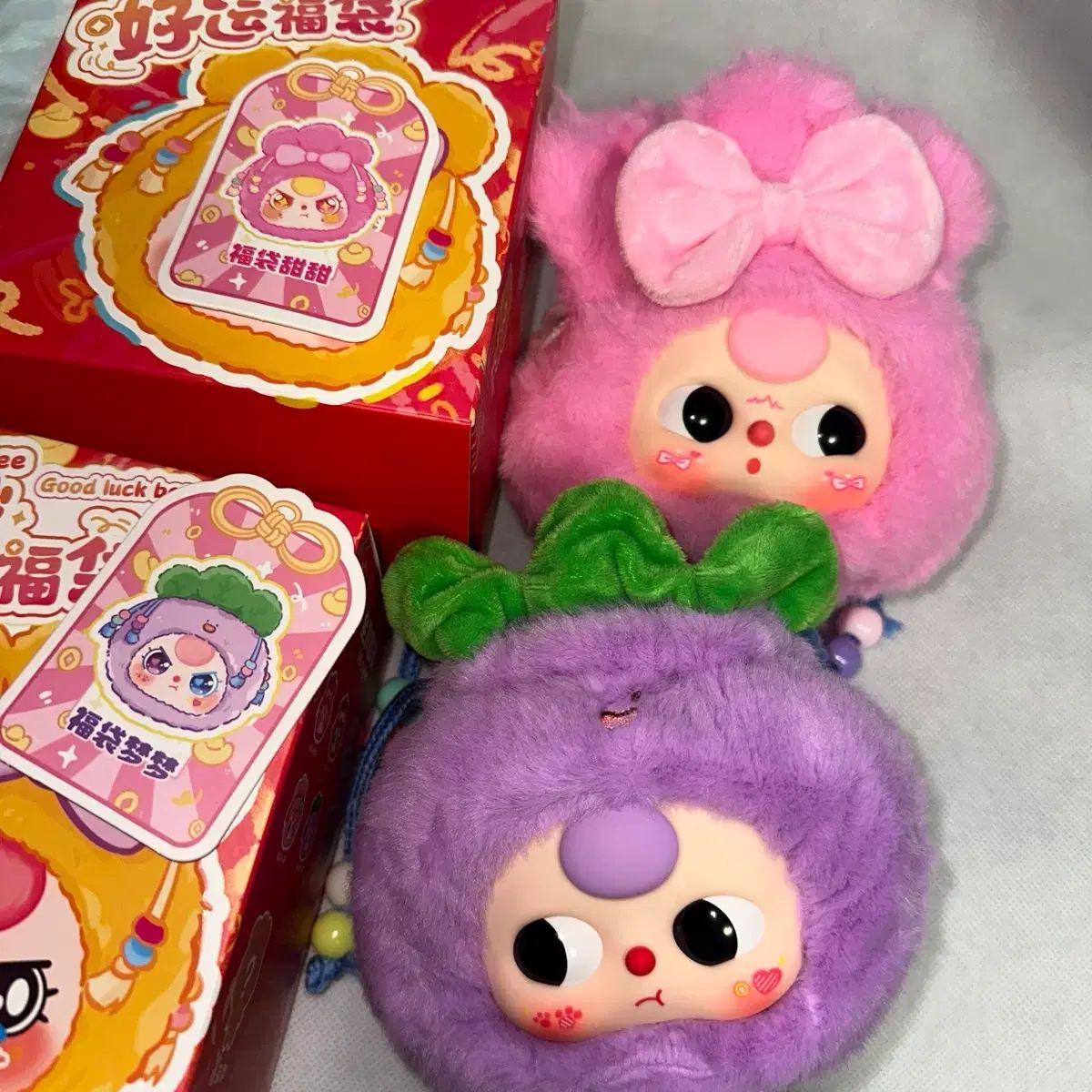 ベイビー3 巾着 ぬいぐるみ キーホルダー ピンク/パープル - メルカリ