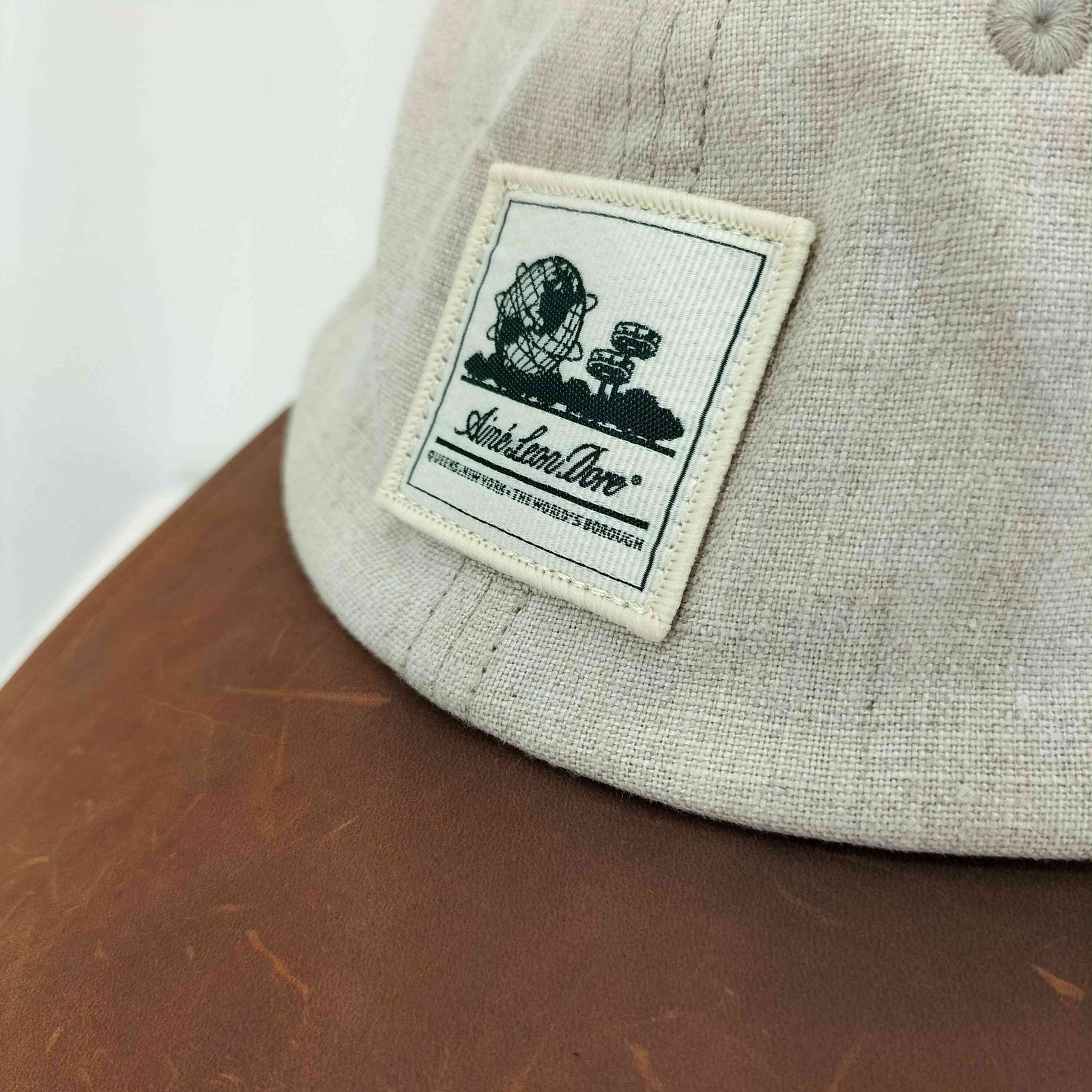エメレオンドレ AIME LEON DORE レザー切替 刺繍スナップバック