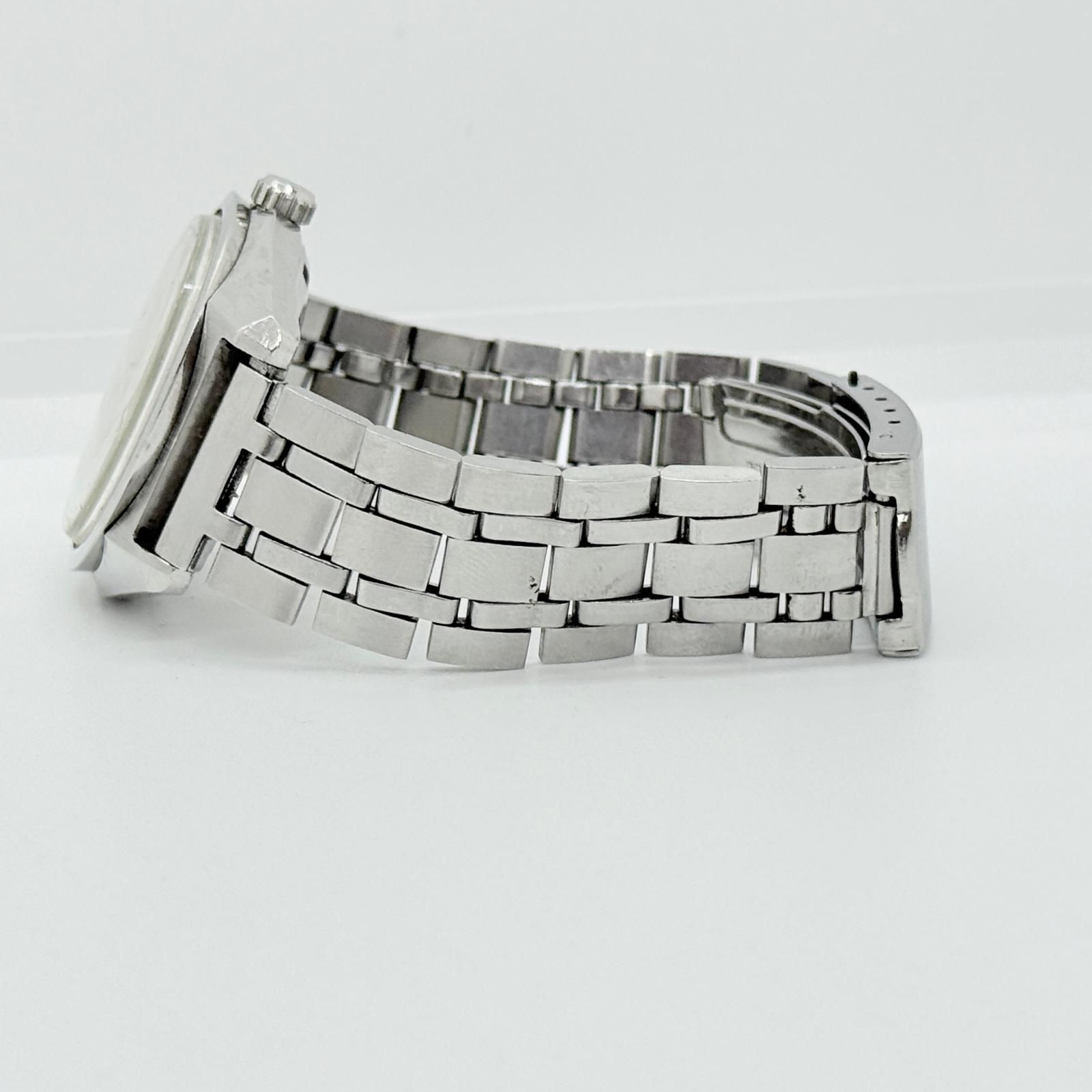 メダリオン 腕時計