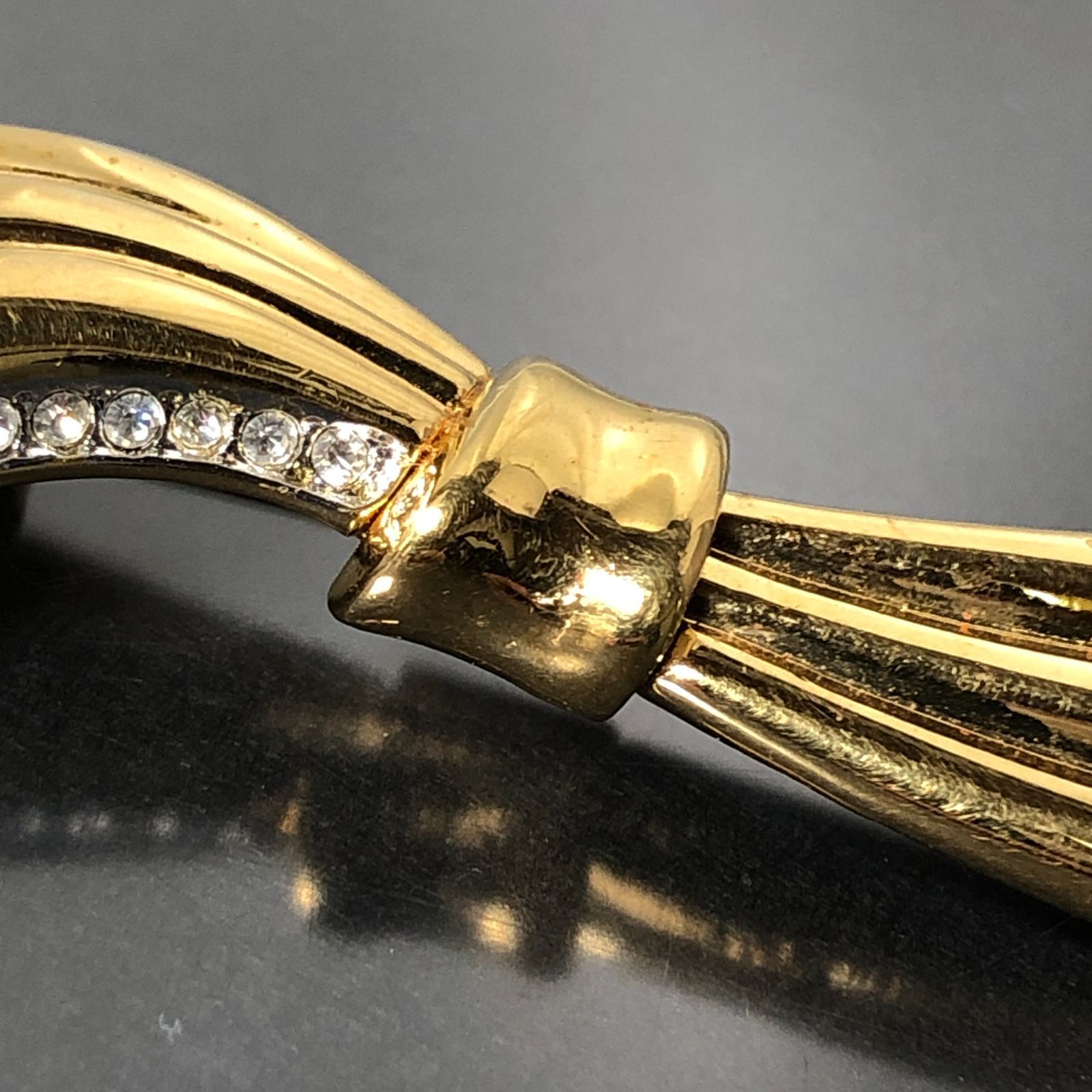 YSL イヴサンローラン ブローチ リボン ゴールドカラー ラインストーン 
