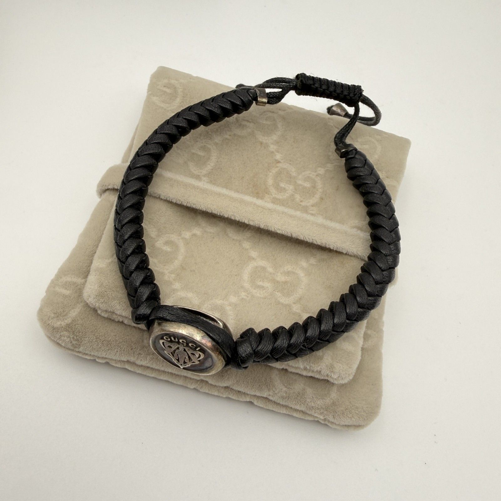 GUCCI（グッチ）クレストエンブレム 編み込みレザーブレスレット Ag925