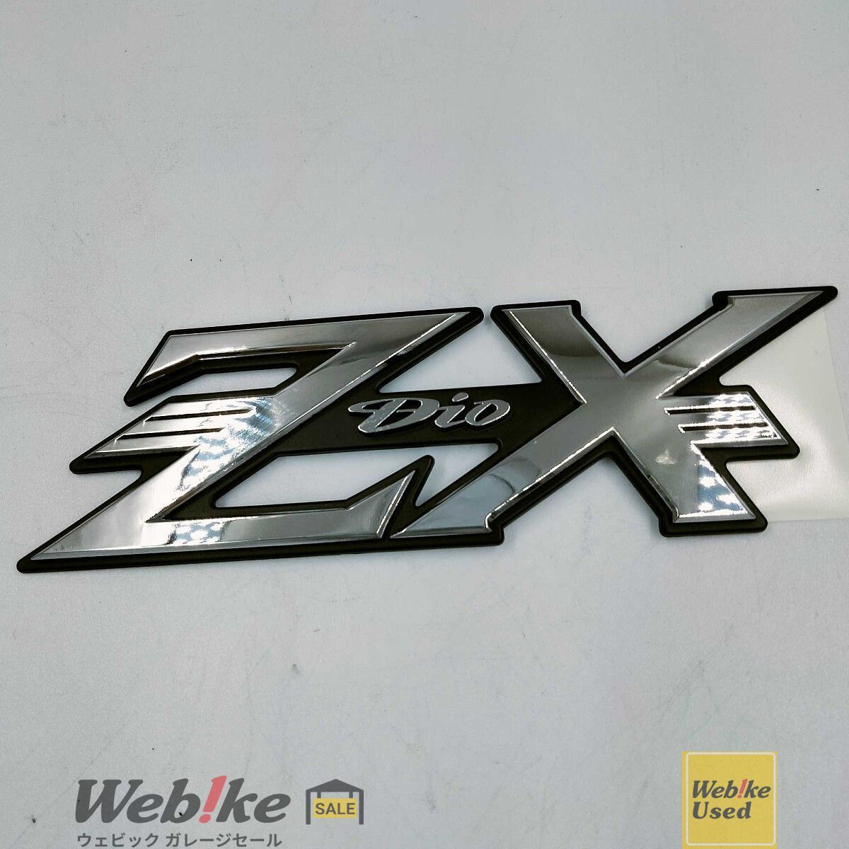 ホンダ純正中古パーツ ライブディオZX シートカウルエンブレム 87131