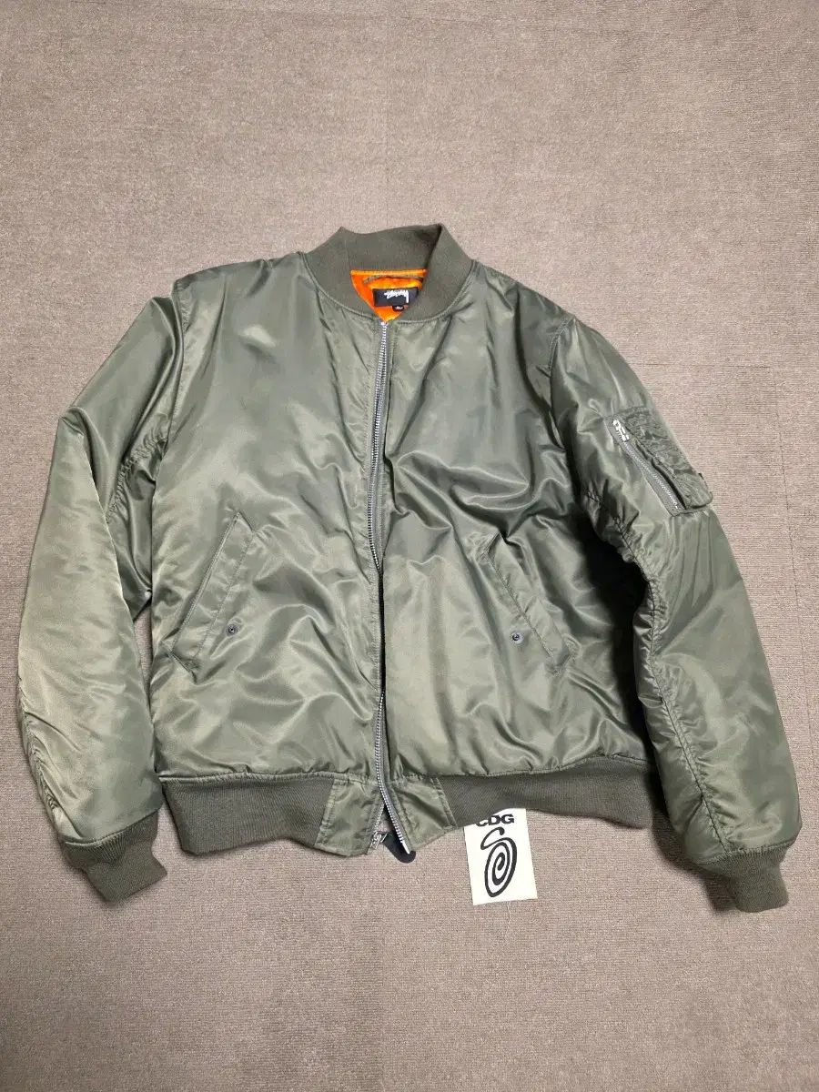L ステューシー x CDG MA-1 ジャケット オリーブ - メルカリ