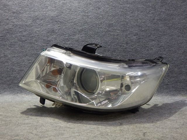 ワゴンR スティングレー 左ヘッドライト HID MH23S 100-59191 35320