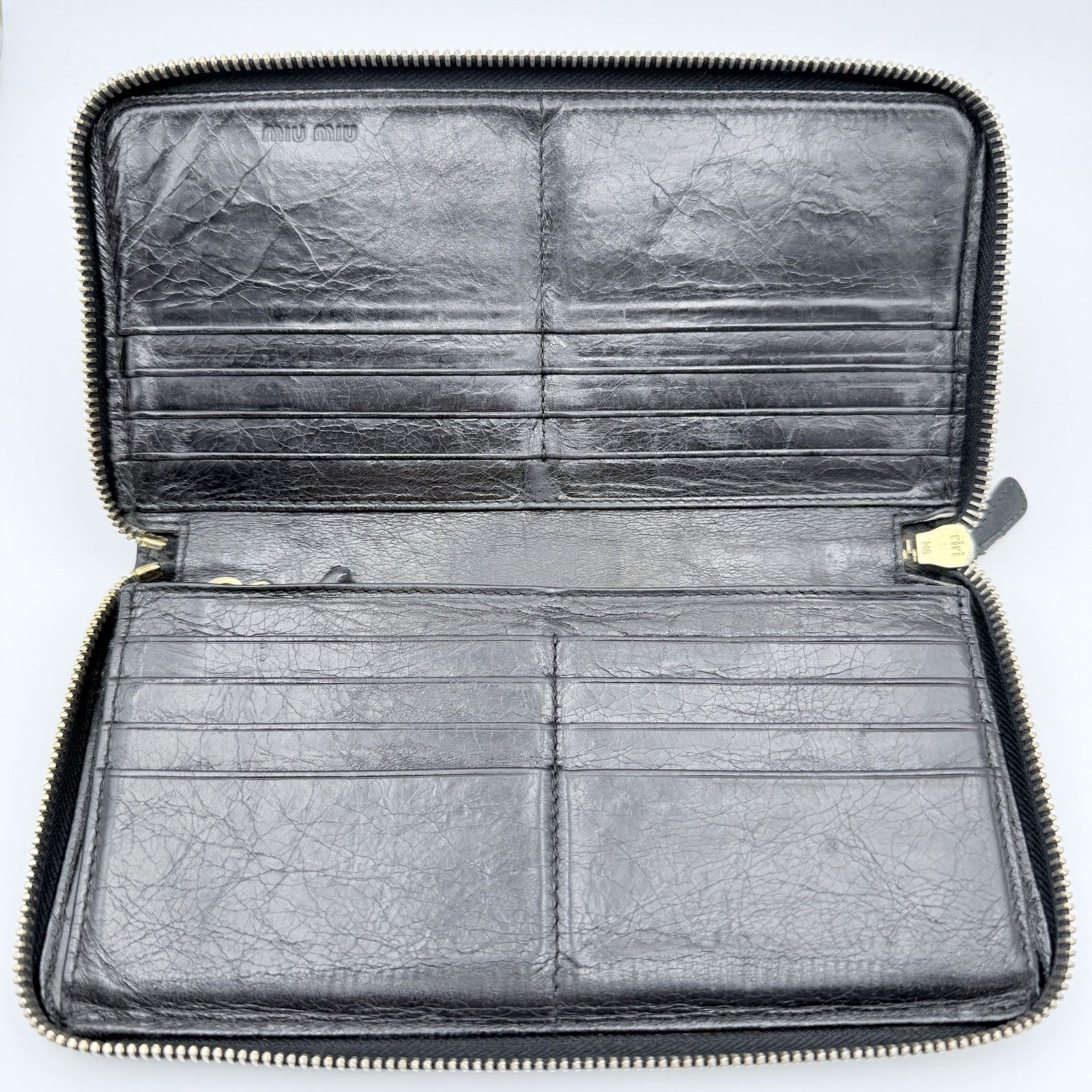 MIU MIU（ミュウミュウ）マテラッセ ラウンドファスナー長財布