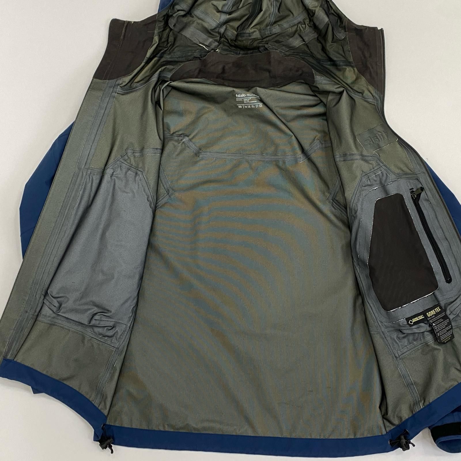 【姫路東店】 中古 tilak | ティラック マウンテンパーカー STORM JACKET ブルー サイズ：XS 【092】 姫路東店】 中古 tilak | ティラック マウンテンパーカー STORM JACKET