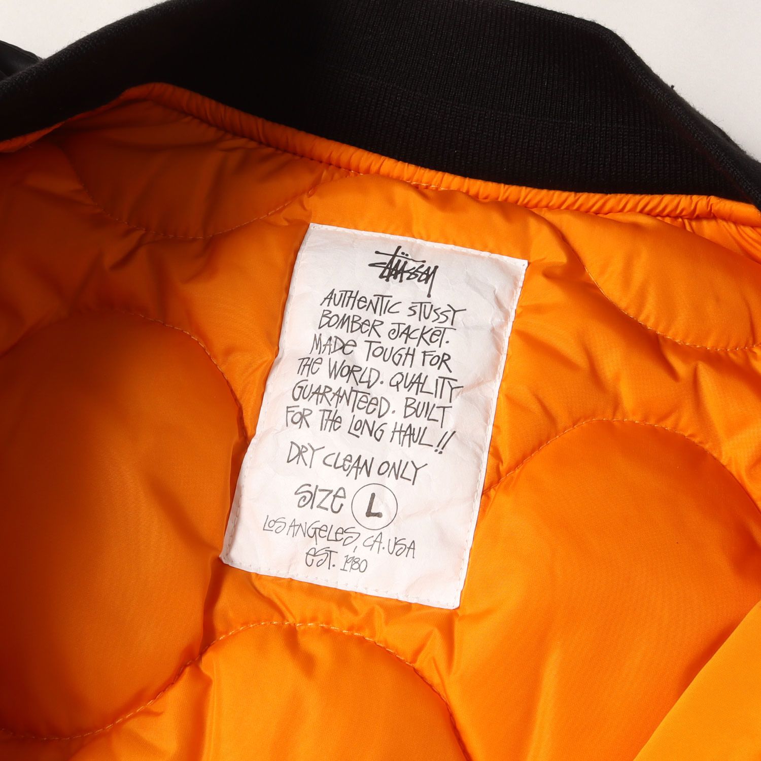 新品】STUSSY ステューシー ジャケット ブラック オレンジ サイズ:L