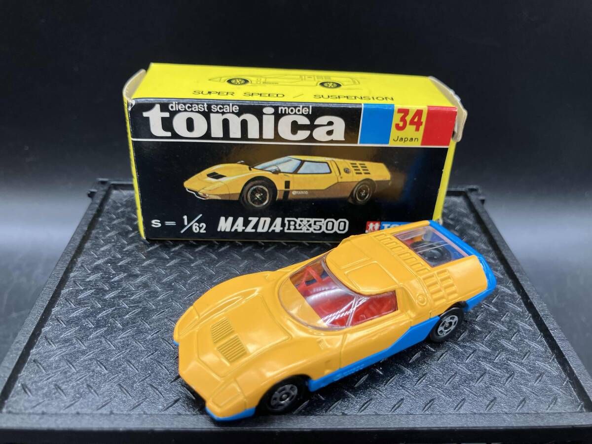 トミカ No.34 マツダ RX500 やまぶき色×水色 赤シｰト 1Eホイｰル 裏板