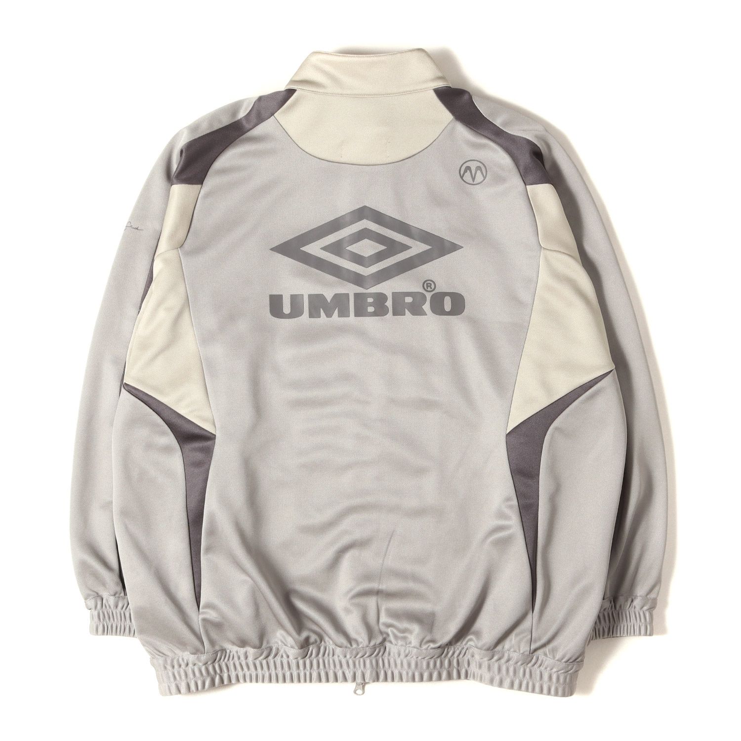 MAGIC STICK ジャケット トーナルグレー サイズ:L | 24SS UMBRO