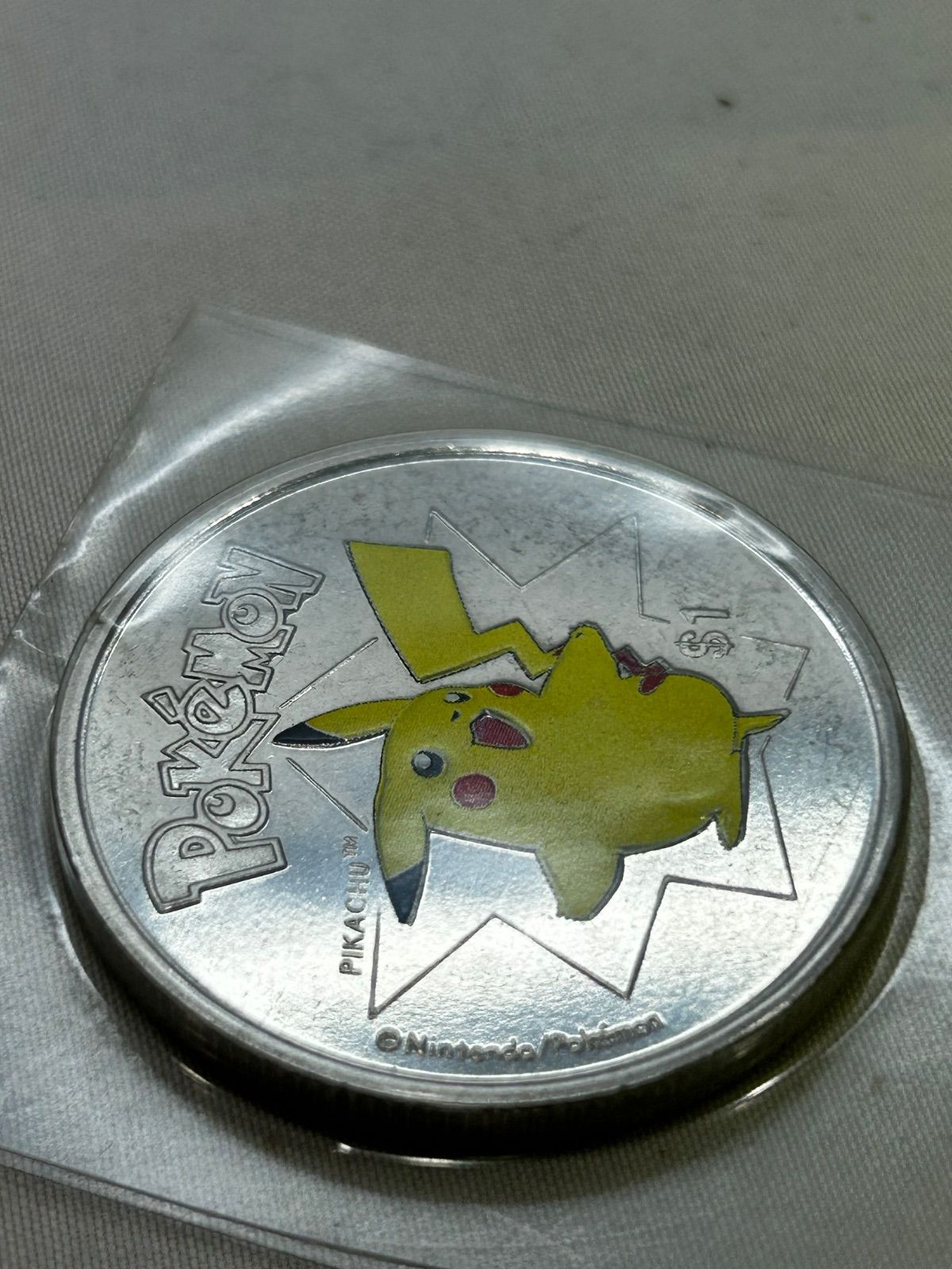 ポケモン ピカチュウ ニウエ 1ドル □ 2002 日本限定 泰星コイン 外国