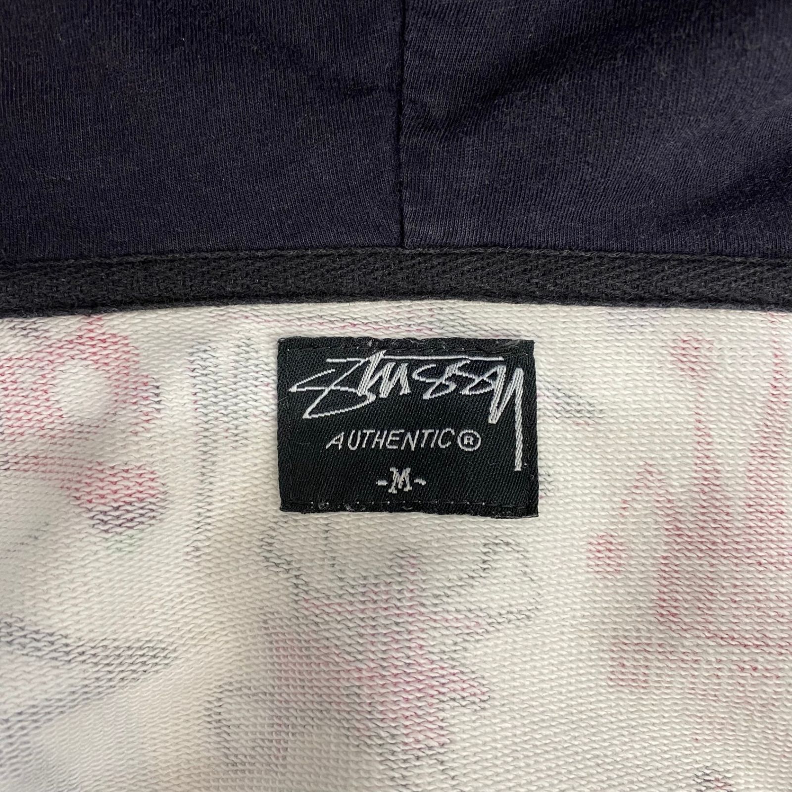 ステューシー STUSSY 歴代ロゴ プリント ジップパーカー 総柄 パーカ 