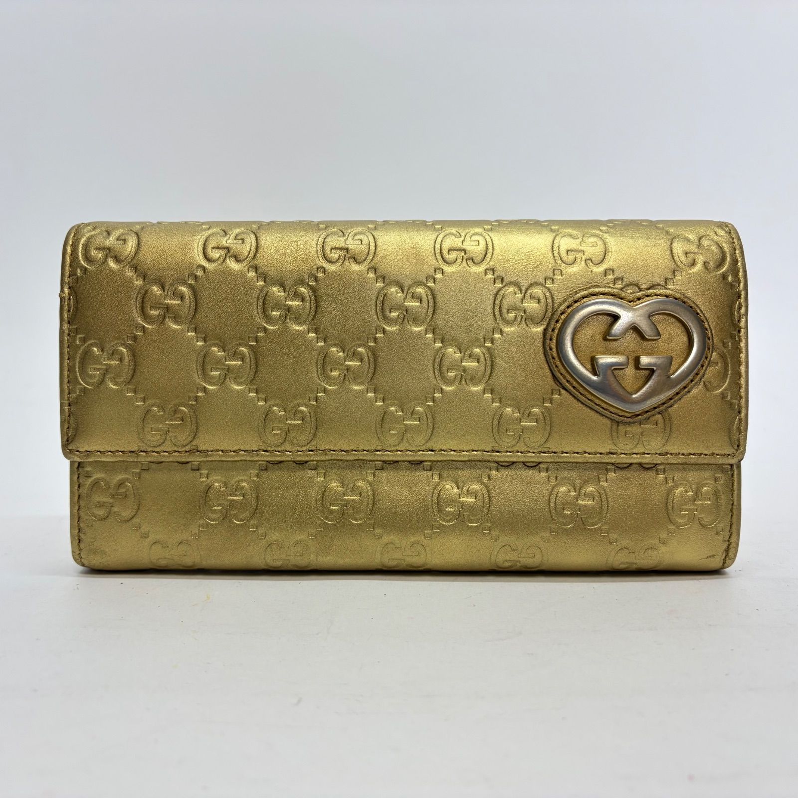3541 GUCCI グッチ 長財布 ゴールド レザー ハートロゴ シマレザー 