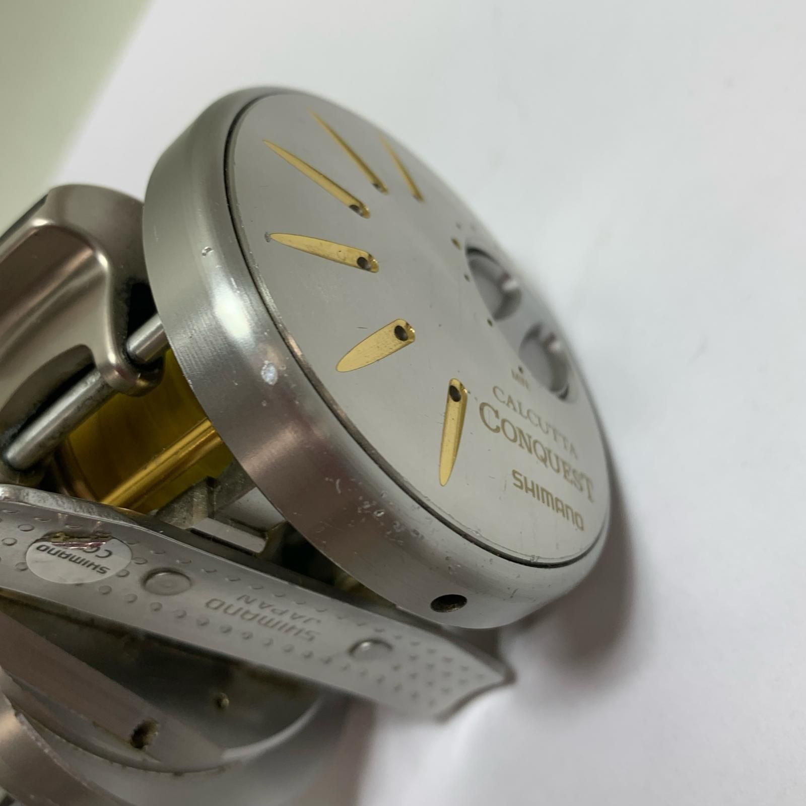 SHIMANO シマノ 04カルカッタコンクエスト101DC ベイトリール キズあり