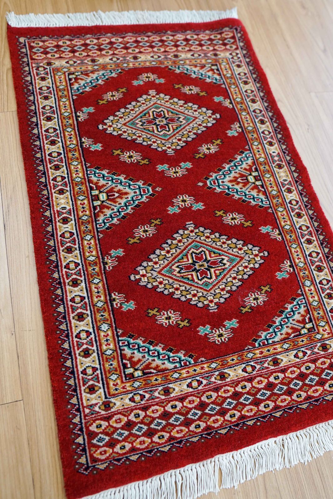 パキスタン手織り絨毯 90×61cm 　トライバル 玄関マット パキスタン手織り絨毯 玄関マット 78×49cm ファインクオリティ 赤基調