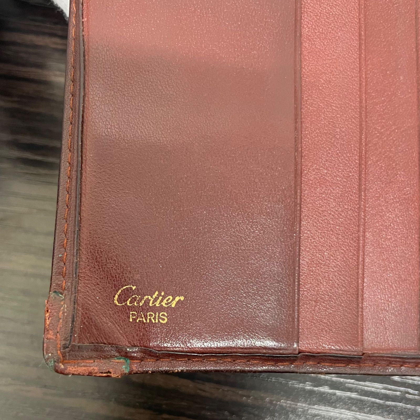 未使用級✨カルティエ　マストライン　二つ折り財布　ロゴ型押し　ボルドー i)Cartier カルティエ 二つ折財布 マストライン 2Cロゴ コインポケット