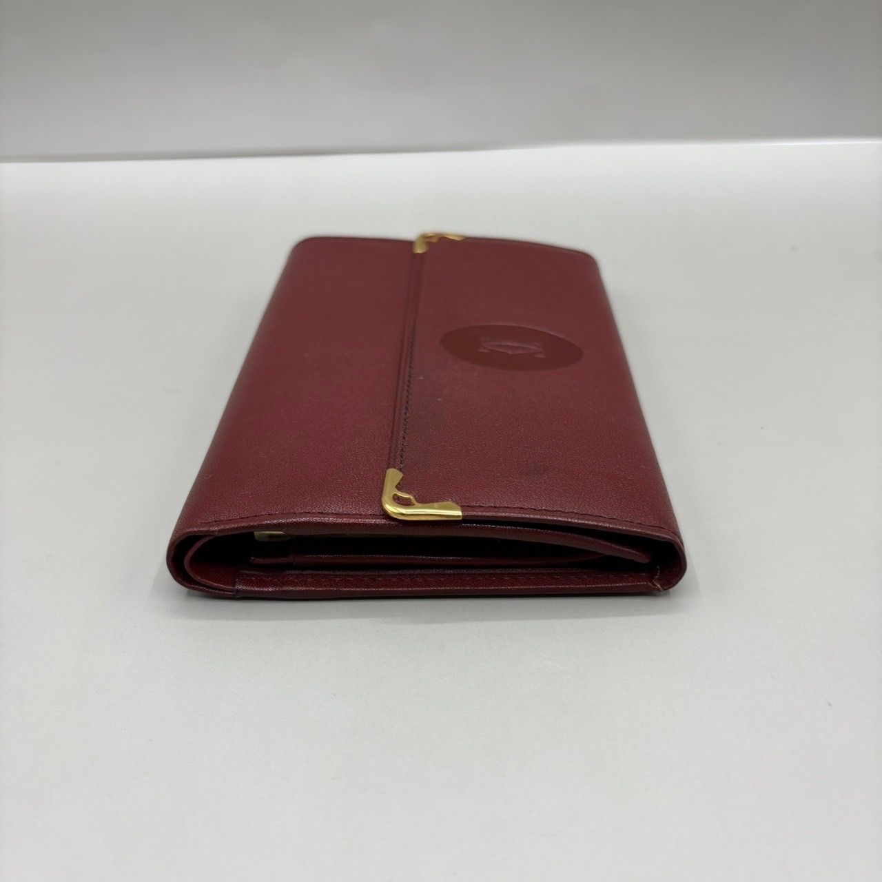 未使用級 Cartier カルティエ 二つ折り財布 マストライン ロゴ型押し