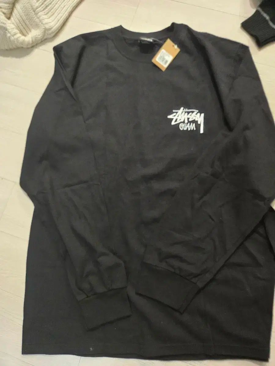 STUSSY(ステューシー) GUAM 黒 長袖 Tシャツ - メルカリ