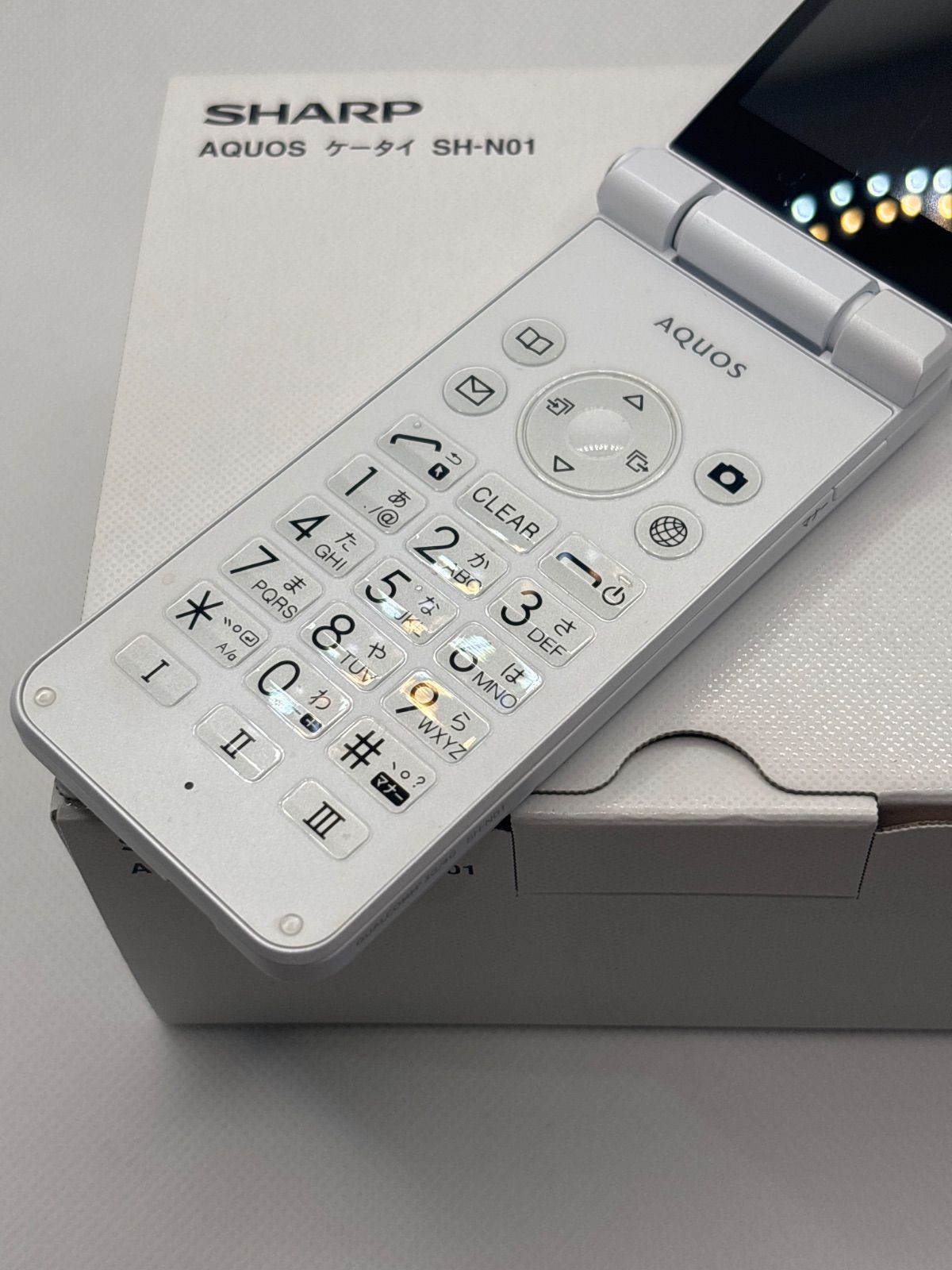 SHARP AQUOSケータイ SH-N01 ホワイト SIMフリー 中古 - メルカリ