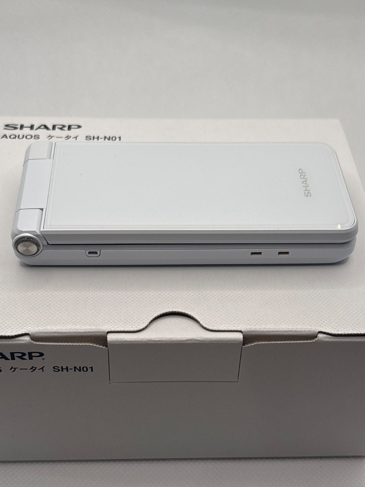 SHARP AQUOSケータイ SH-N01 ホワイト SIMフリー 中古 - メルカリ
