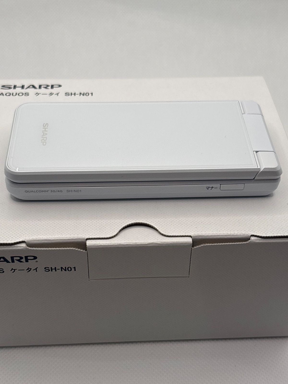 SHARP AQUOSケータイ SH-N01 ホワイト SIMフリー 中古 - メルカリ