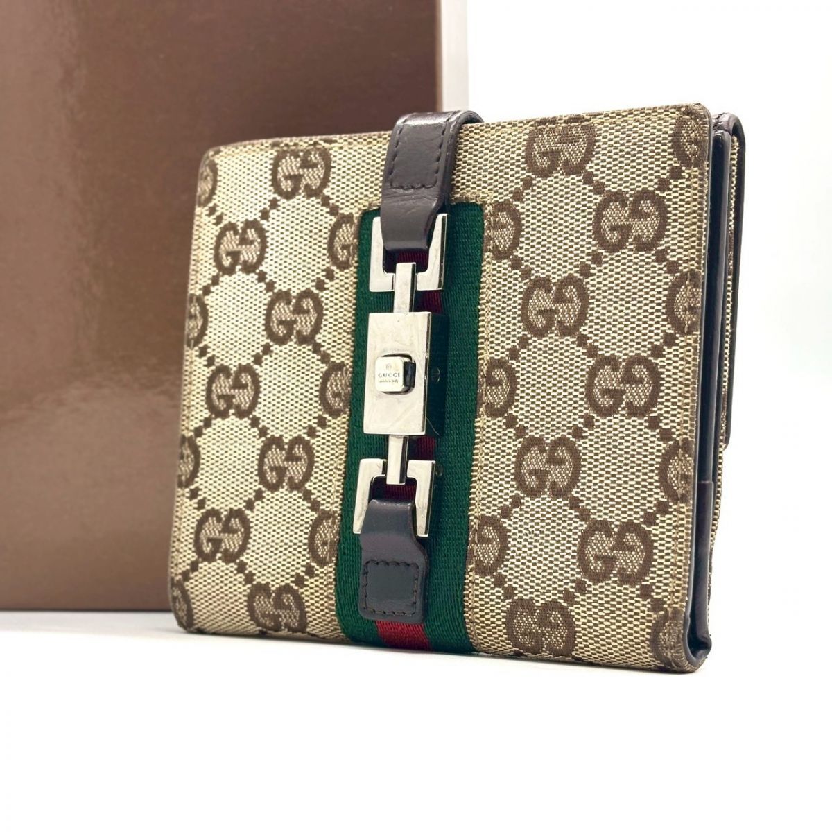 伝統が映える手元】 GUCCI 二つ折り財布 ジャッキー GGキャンバス 