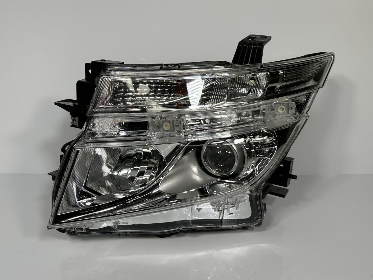 良品 エルグランド PE52 TE52 前期 純正 左ヘッドライト 左ライト HID