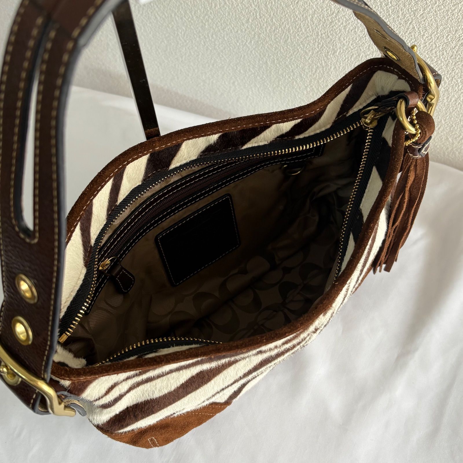 OneMall provides Mercari products: COACH Zebra Unborn calf Mini 
