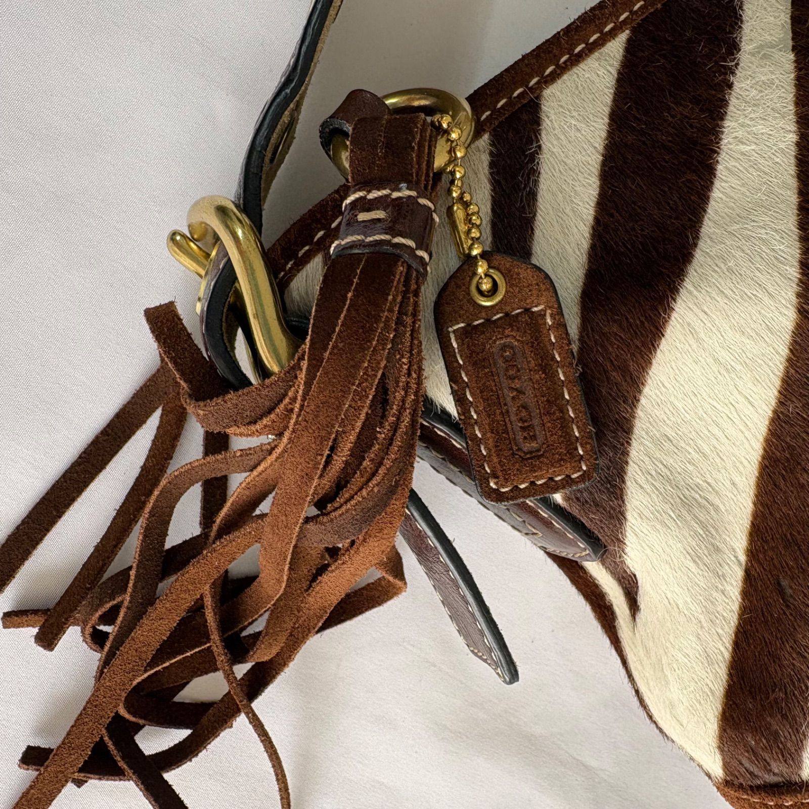 OneMall provides Mercari products: COACH Zebra Unborn calf Mini 