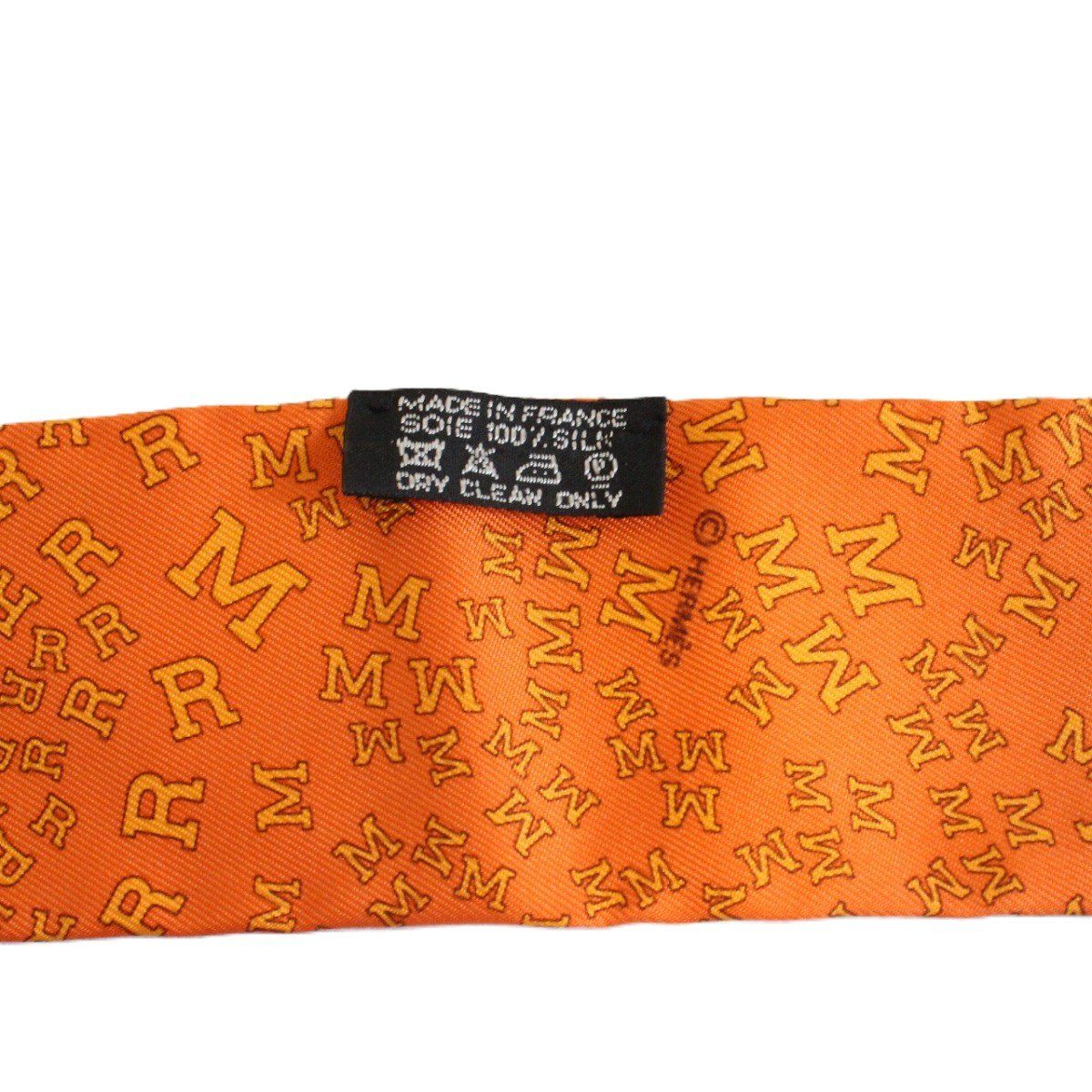 未使用級✨エルメス　ツイリー　アルファベット総柄　オレンジ　グラデーション調 HERMES エルメス ツイリー アルファベット シルク100％ オレンジ系【い