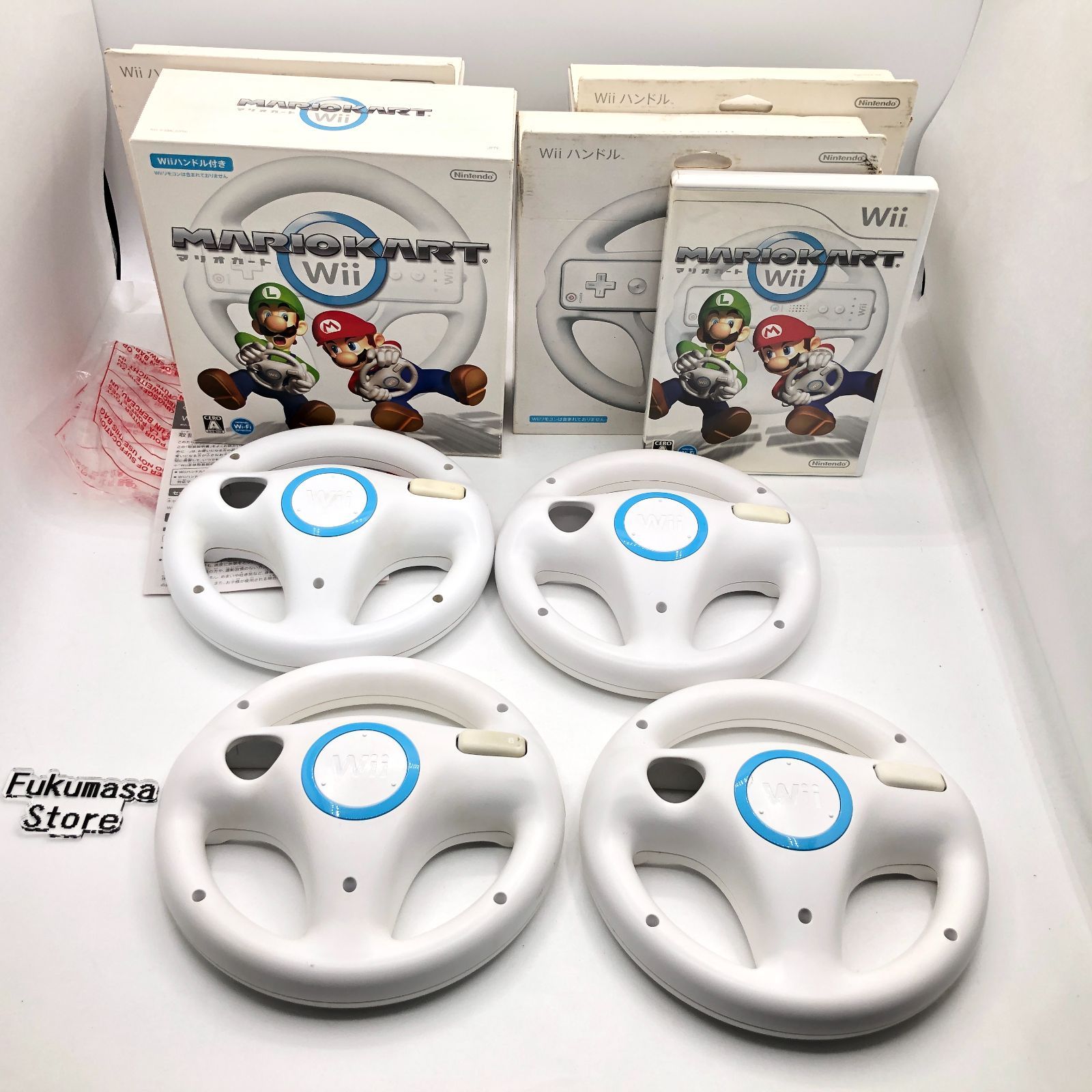セールスショップ 美品 マリオカートWii + 純正ハンドル4個セット セールスショップ 美品 マリオカートWii + 純正ハンドル4個セット