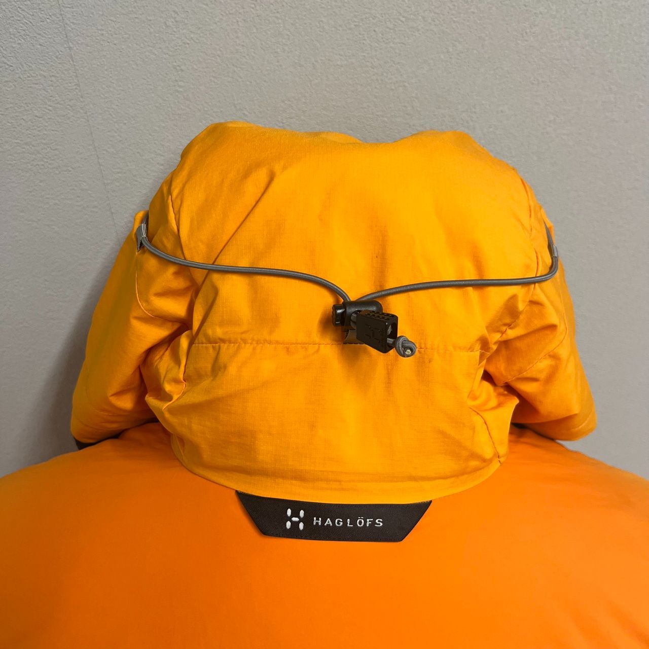□HAGLOFS ホグロフス 中綿フード ダウンジャケット オレンジ 古着 A26 