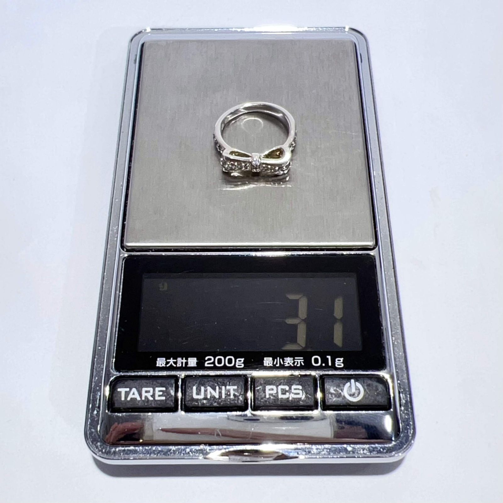 4℃ ヨンドシー SV925 リボン モチーフ CZ リング 8号 3.1g ホワイト 