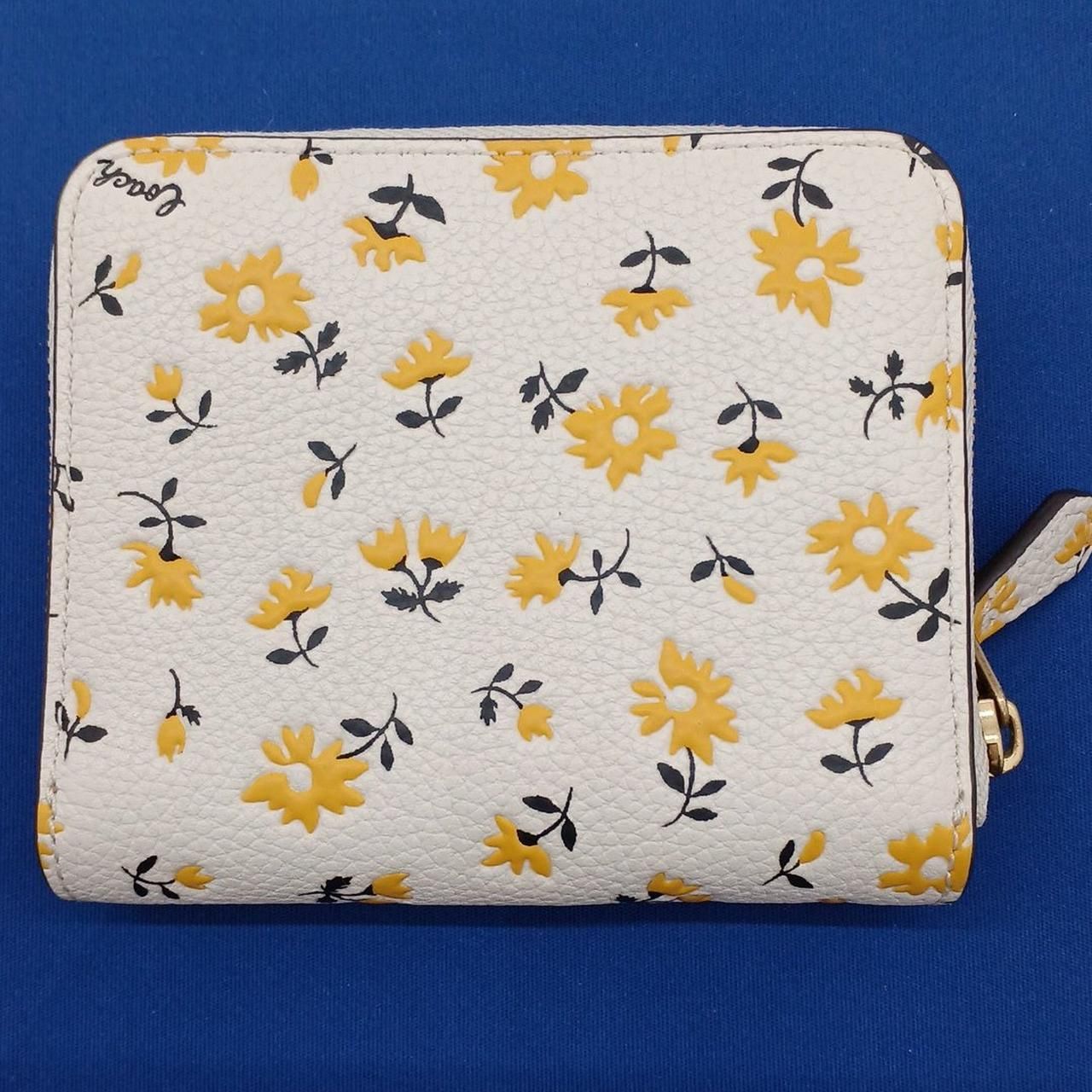 COACH 型番：CR555 ビルフォールド ウォレット・フローラル プリント