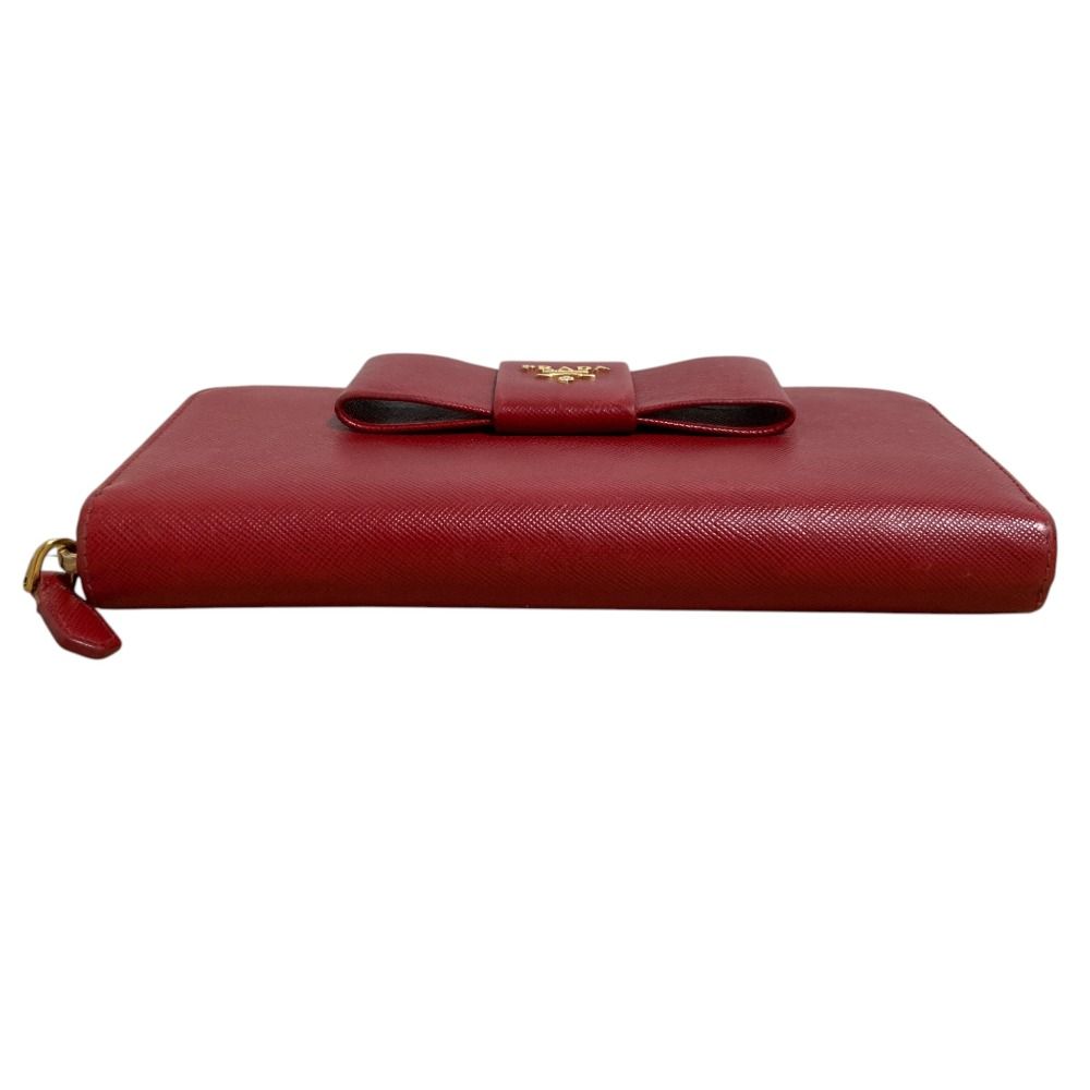 良品】 PRADA プラダ レザー 長財布 リボンモチーフ レッド 赤 