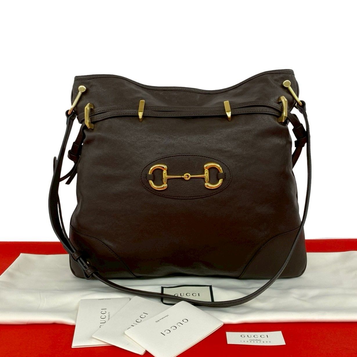 ほぼ未使用 希少品 保存袋付き GUCCI グッチ ホースビット 金具 レザー 本革 巾着 ショルダーバッグ ボディバッグ ブラウン 茶 35587 ほぼ未使用 希少品 保存袋付き GUCCI グッチ ホースビット 金具 レザー