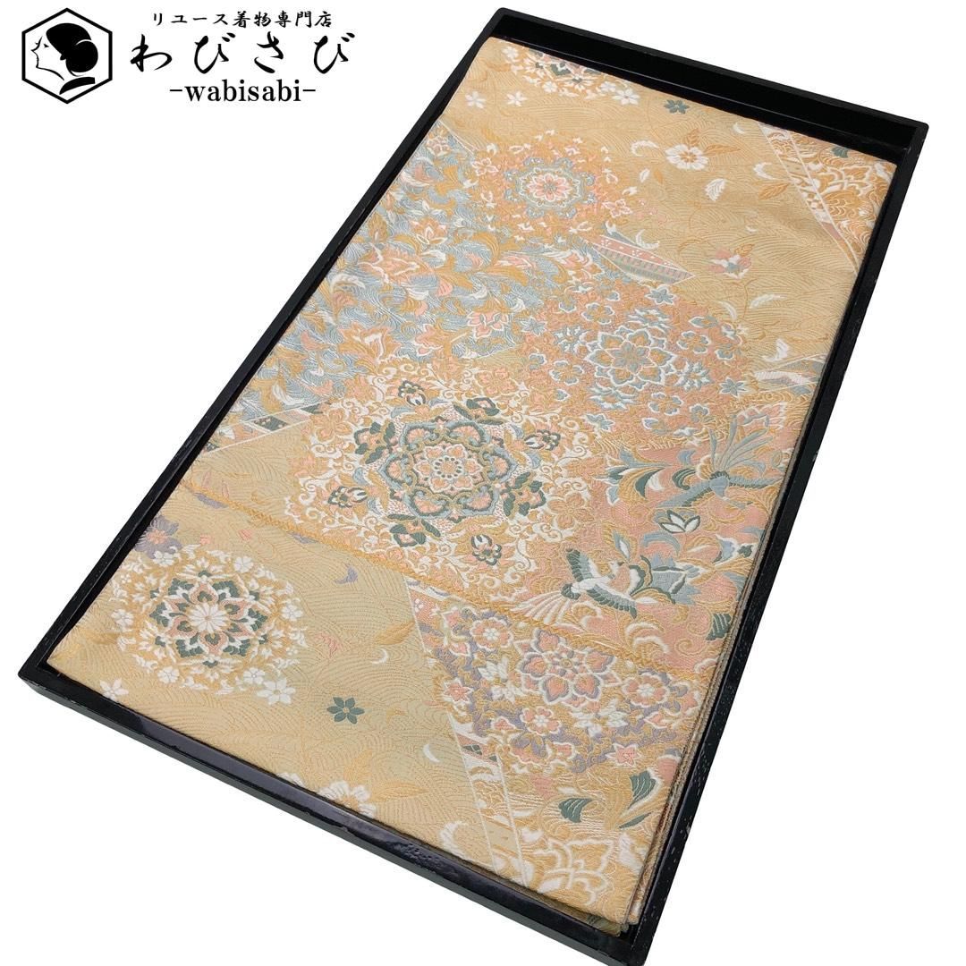 袋帯 祝華文絵図 鳳凰 花唐草模様 波模様 麹色 O-6086 - メルカリ
