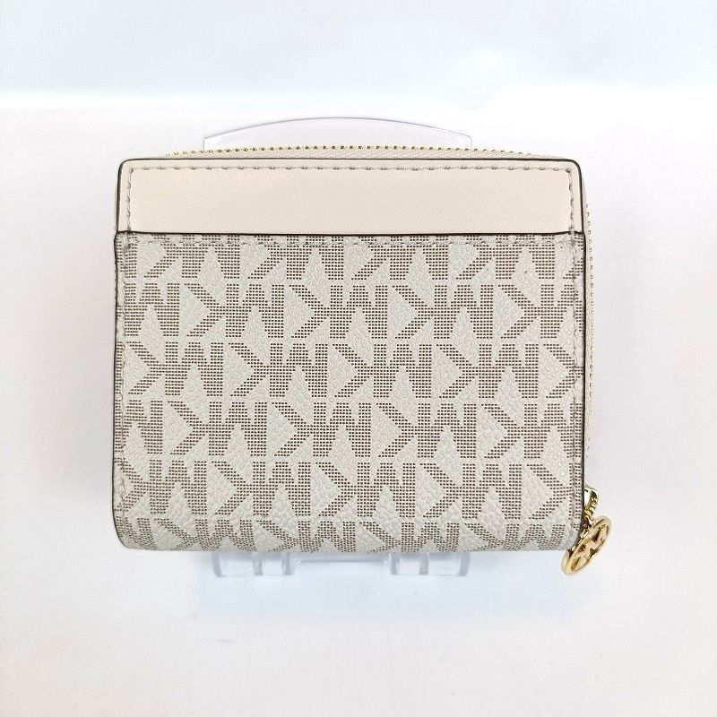未使用 マイケルコース 二つ折り財布 ホワイト系 レディース ロゴ 保存袋 未使用 MICHAEL KORS マイケルコース 二つ折り財布 ホワイト系