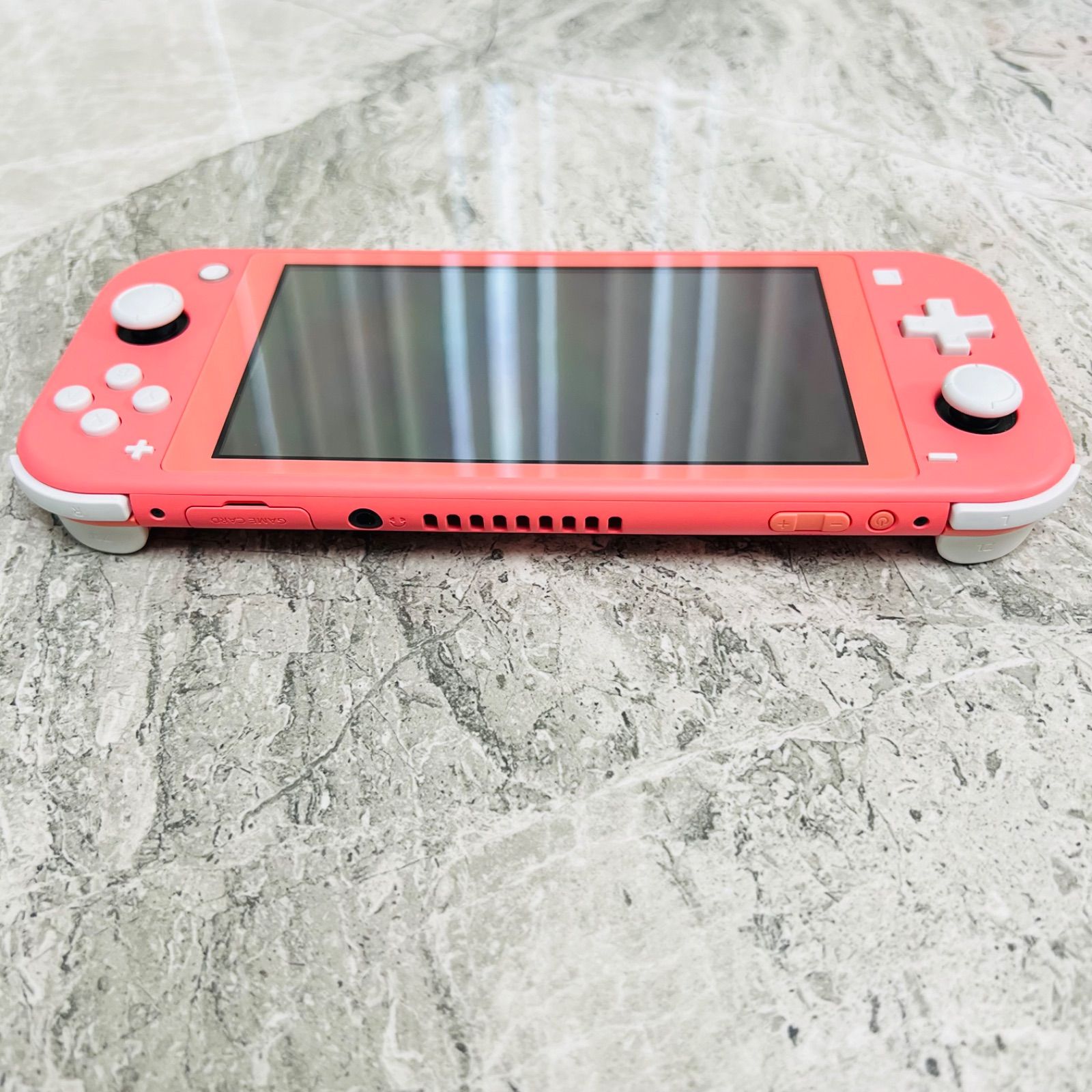 完動品】Nintendo Switch lite コーラル - メルカリ